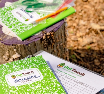 Out Teach notebooks outdoors